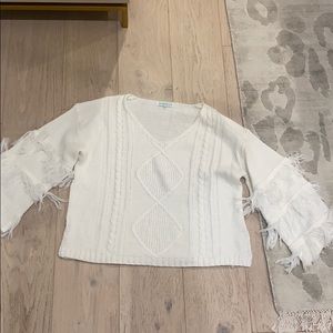 White fringe sleeve sweater size medium the mint